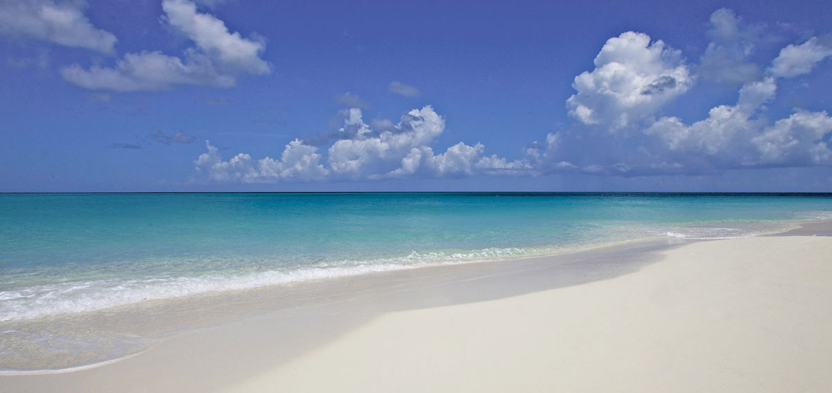 The 12-mile Grace Bay beach. The aquamarine colours, the clarity and the calmness of the water are unbelievable. photo via thesomerset.com.