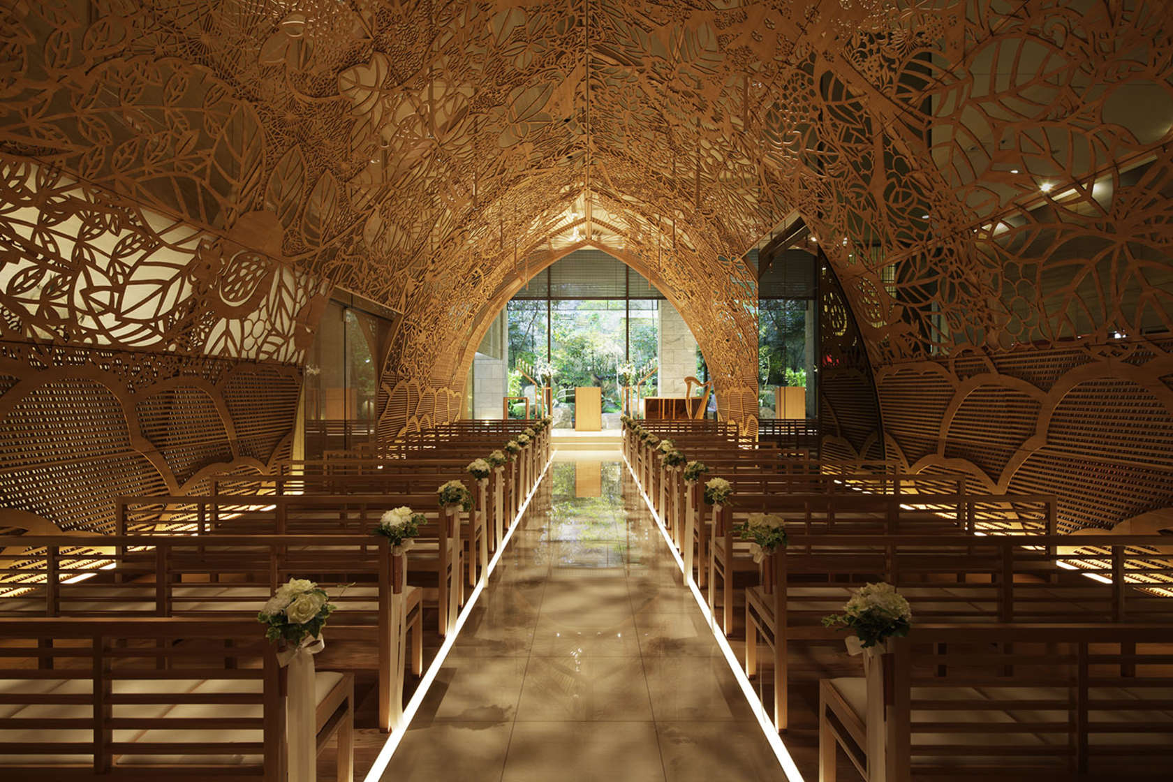 The Ana Crowne Plaza Hotel Chapel in Hiroshima. The dome’s wooden cutwork casts shadows like sunlight through the trees, creating an illusion of a sun-dappled forest. 