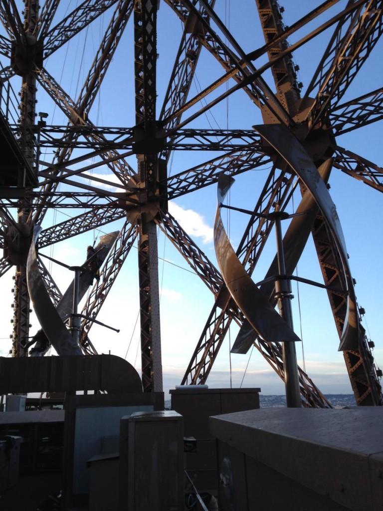 Wind Turbines on the Eiffel Tower. New York-based renewable energy provider UGE, In partnership with the Société d’Exploitation de la Tour Eiffel (SETE), installed two VisionAIR5 vertical axis wind turbines. image:UGE