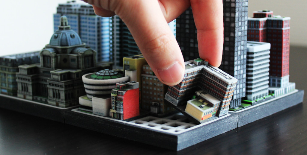 Miniature 3d printed buildings by Ittyblox. 